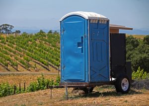 deluxe porta potty near a winery